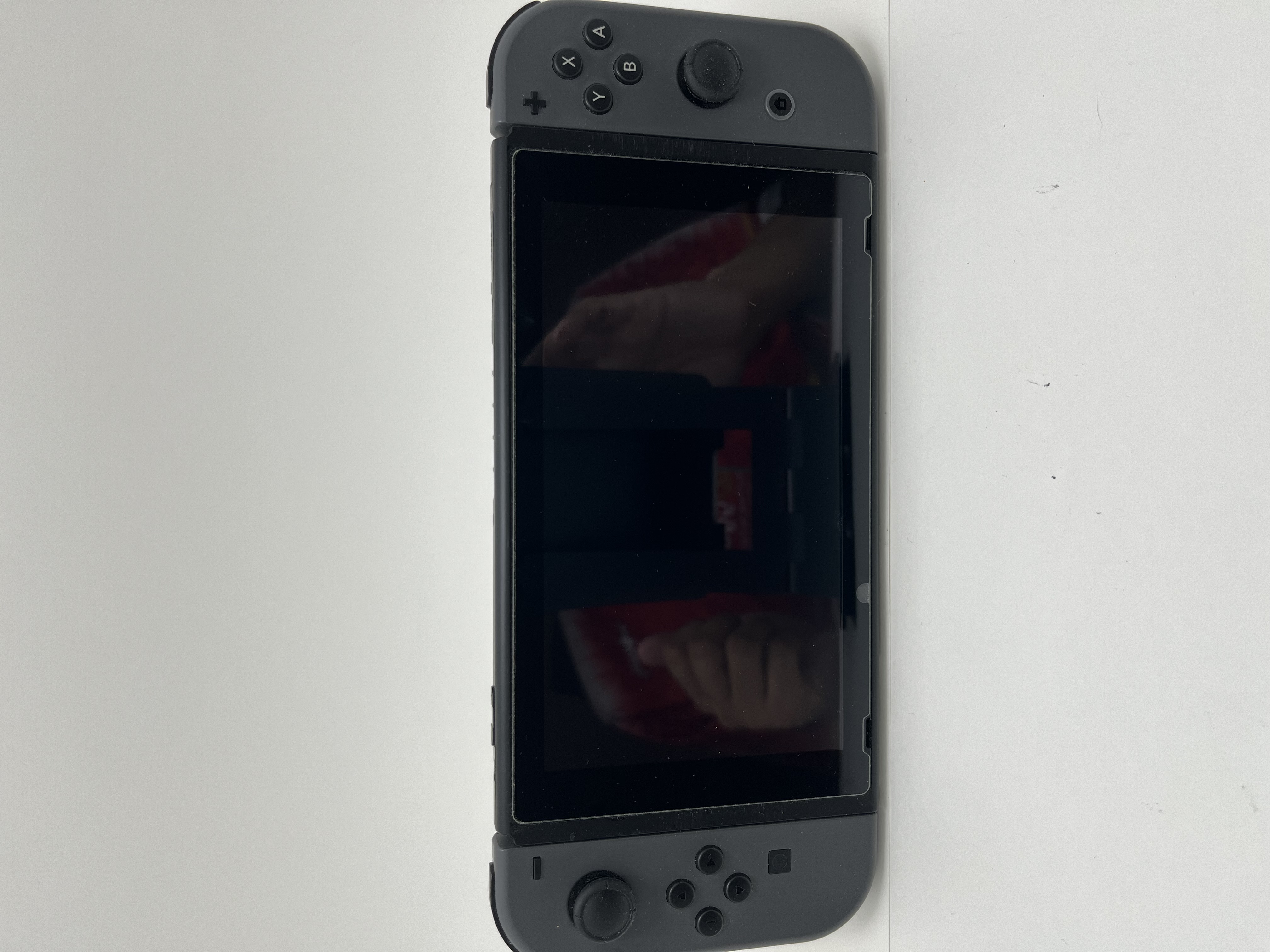 Nintendo Switch V2 สีเทา มือสอง พร้อมจอยและอุปกรณ์ตามภาพ
